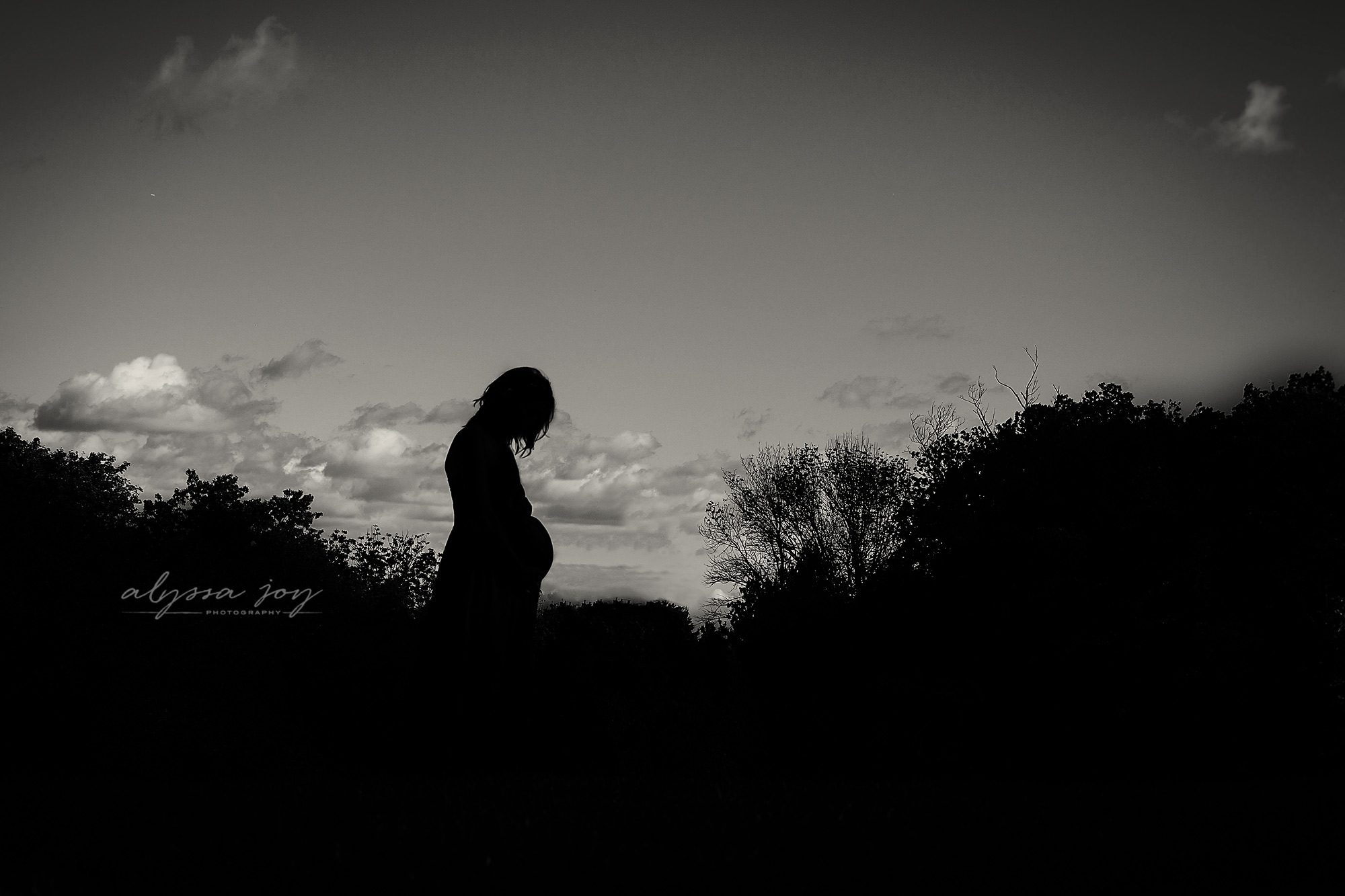 black and white silhouette image of pregnant mommy to be Alyssa Joy Photography