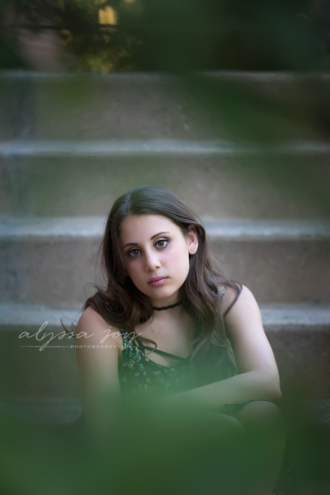 image of teen girl shot through tree by Alyssa Joy Photography
