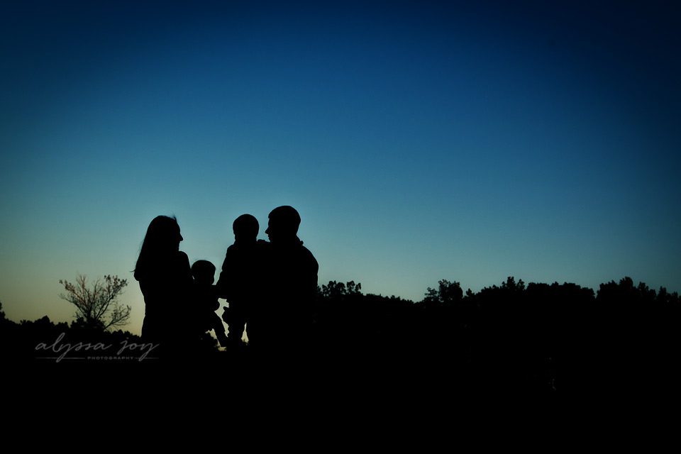 evening silhouette image of family of four Alyssa Joy Photography