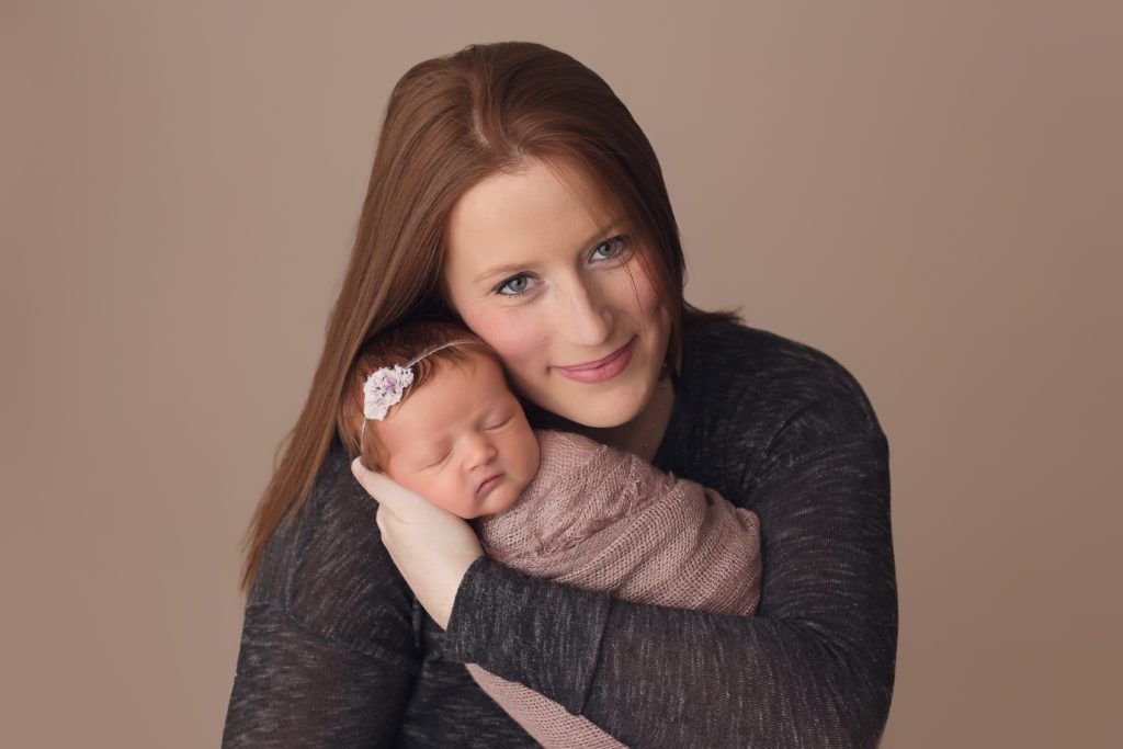 photo of red headed mom and her red headed newborn baby girl
